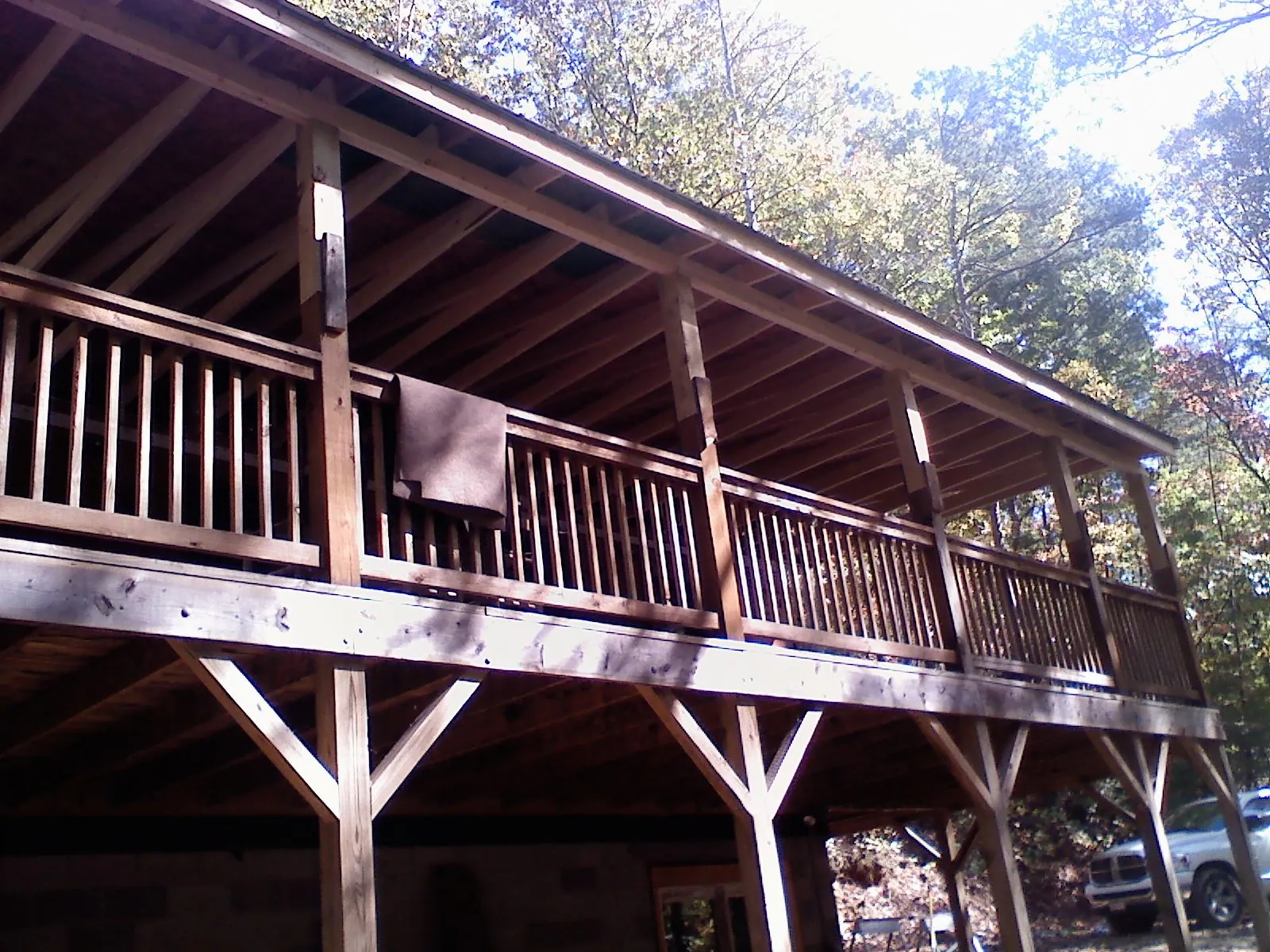Timber framing under a new elevated porch and deck — Roof Leak Repair in Roosevelt by Roofing Brothers